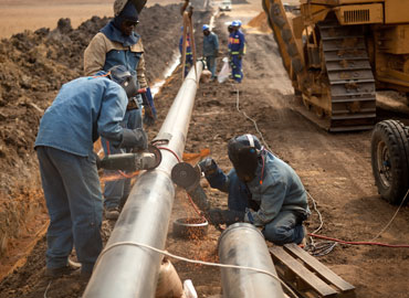 Pipeline under Construction Worker during pipeline construction